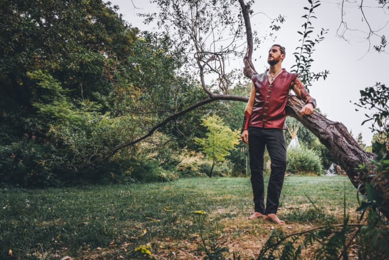 Adam FaeTerra standing in nature